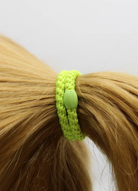 KKNEKKI es una marca de gomas de pelo original y colorida