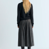 THE NEW SOCIETY marca española de ropa para mujer estilo atemporal y contemporáneo.