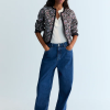 THE NEW SOCIETY marca española de ropa para mujer estilo atemporal y contemporáneo.